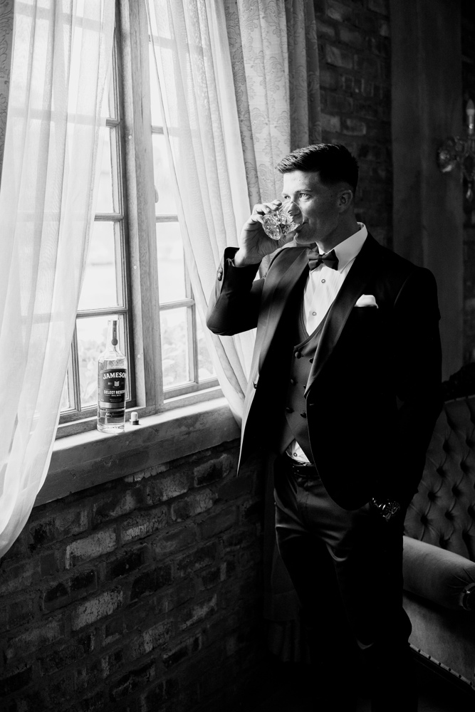 Groom portrait, black and white