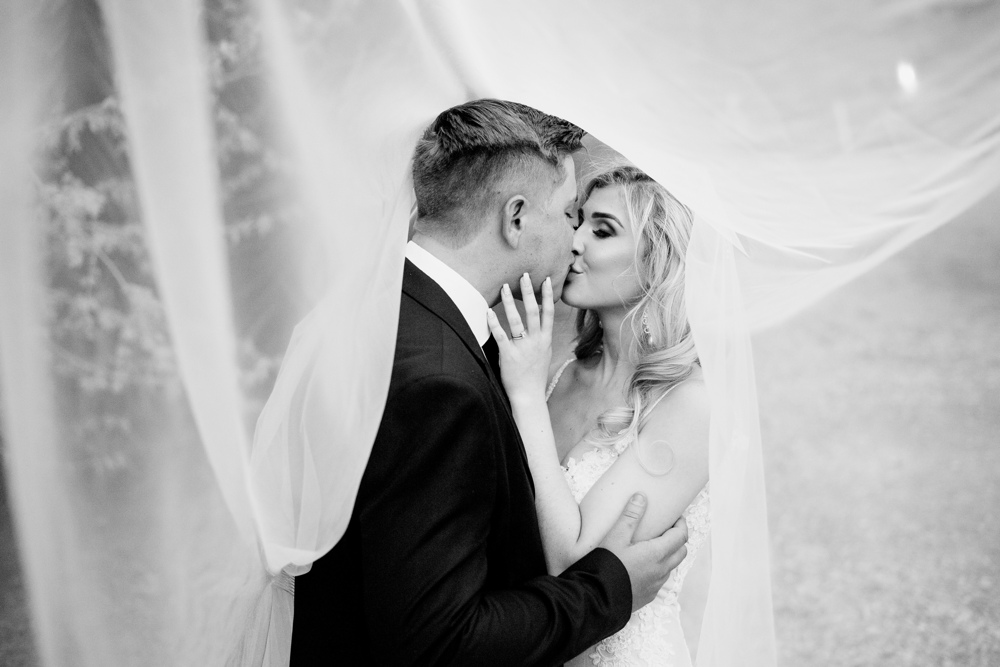 Couple embracing, timeless elegance